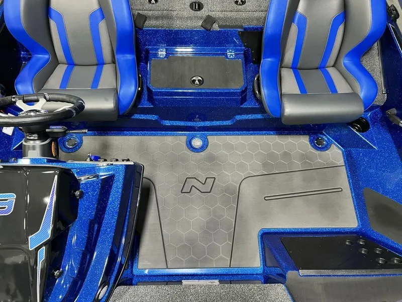 Slide: The Image of Interior of 2025 Nitro Z19 Pro boat with blue and gray seating. - 11