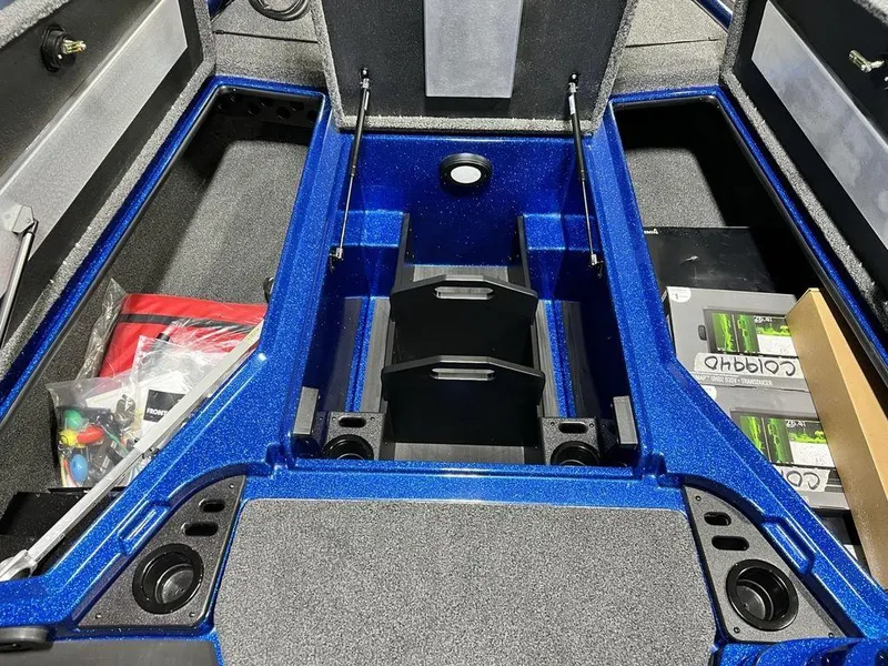 Slide: The Image of 2025 Nitro Z19 Pro boat interior with storage compartments and accessories. - 12
