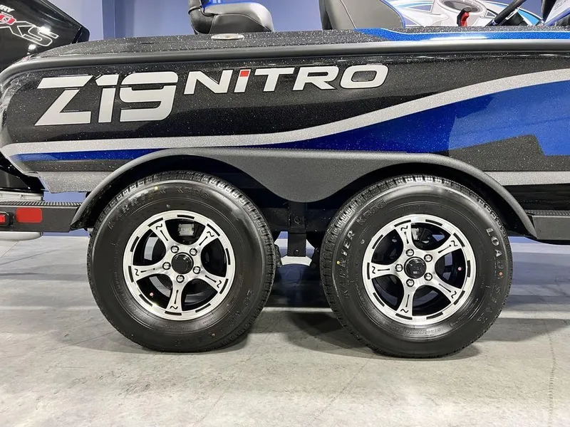 Slide: The Image of 2025 Nitro Z19 Pro boat trailer with dual wheels and sleek design. - 18