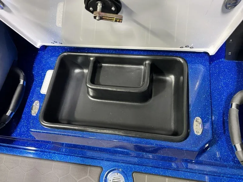 Slide: The Image of Black storage compartment in 2025 Nitro Z19 Pro boat, blue interior detailing. - 20