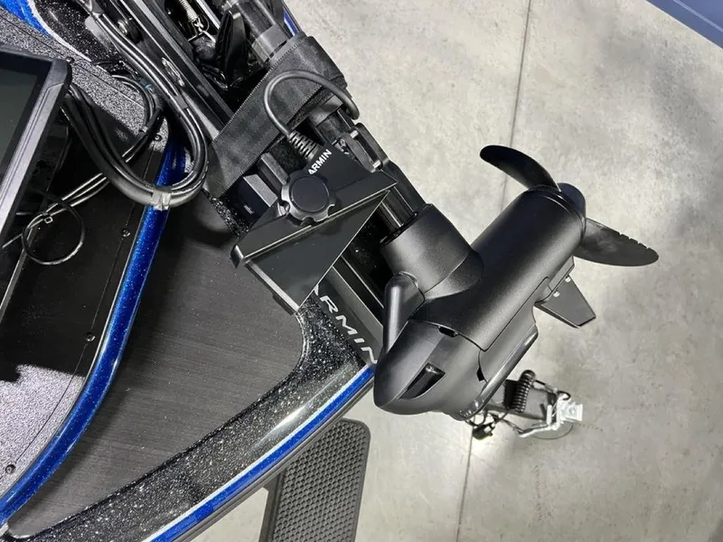 Slide: The Image of Close-up of a 2025 Nitro Z19 Pro boat motor and propeller on a concrete floor. - 22