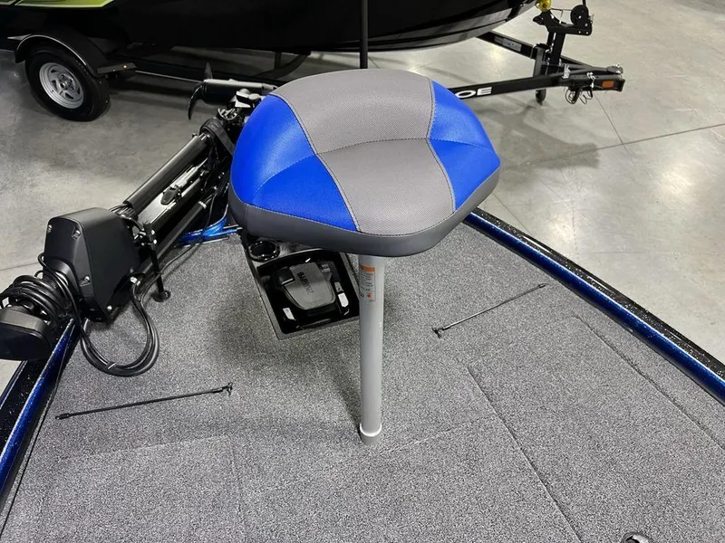 Slide: The Image of Nitro Z19 Pro 2025 boat seat with blue and gray upholstery on deck. - 26