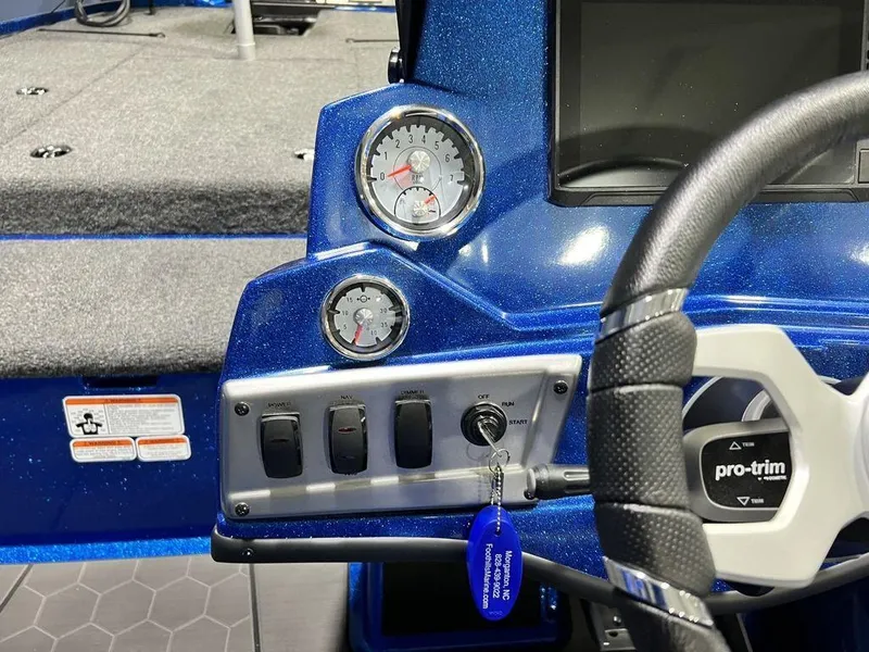 Slide: The Image of Dashboard of 2025 Nitro Z19 Pro boat with gauges and steering wheel. - 29