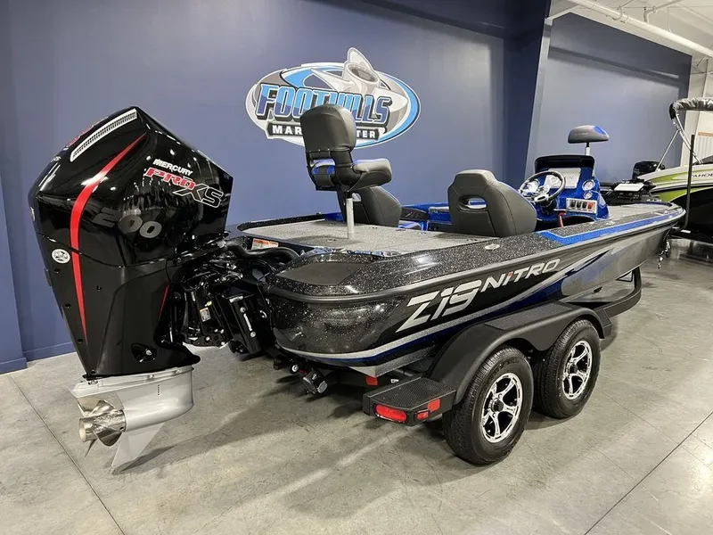 Slide: The Image of 2025 Nitro Z19 Pro boat with powerful engine in showroom. - 30