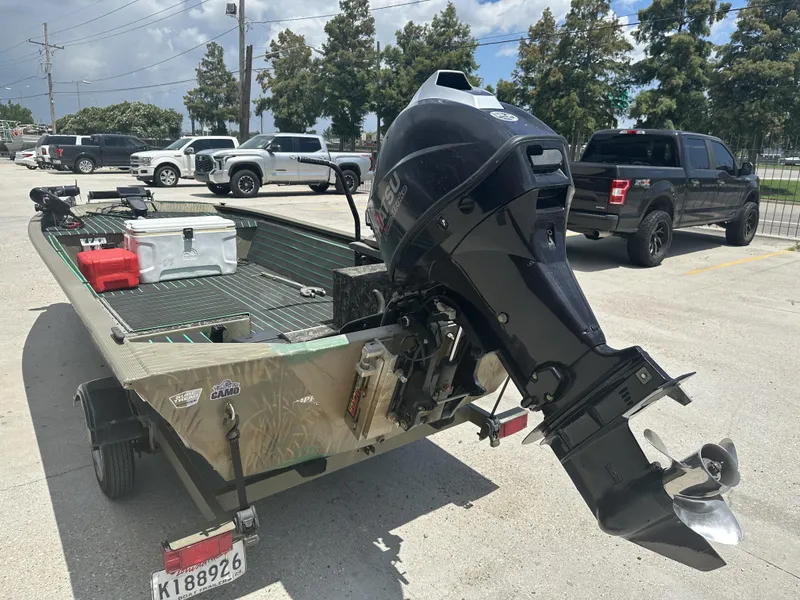Slide: The Image of 2016 Tracker 1648 boat with outboard motor and equipment on trailer. - 3