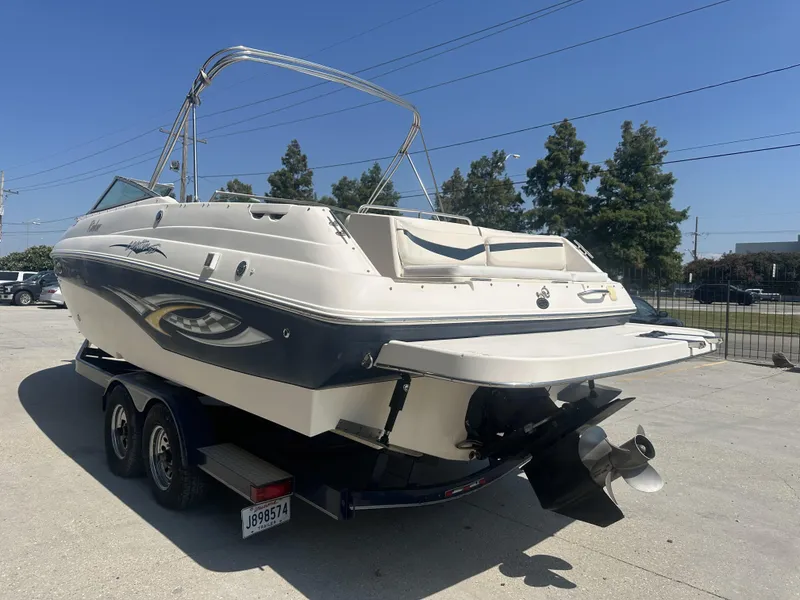 Slide: The Image of 2003 Rinker 282 Captiva boat on trailer, rear view. - 2