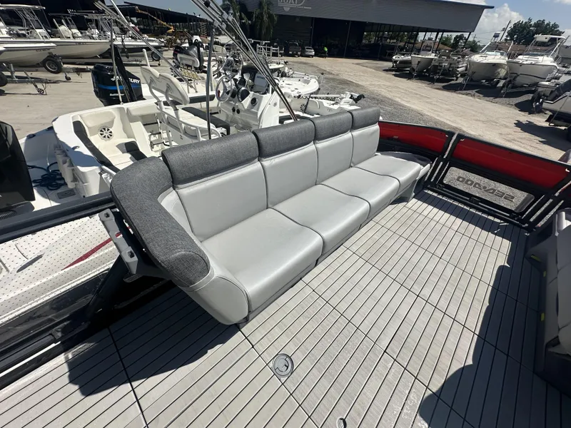 Slide: The Image of 2023 Sea-Doo Switch Cruise 21' 230HP pontoon boat with spacious seating and modern design. - 12