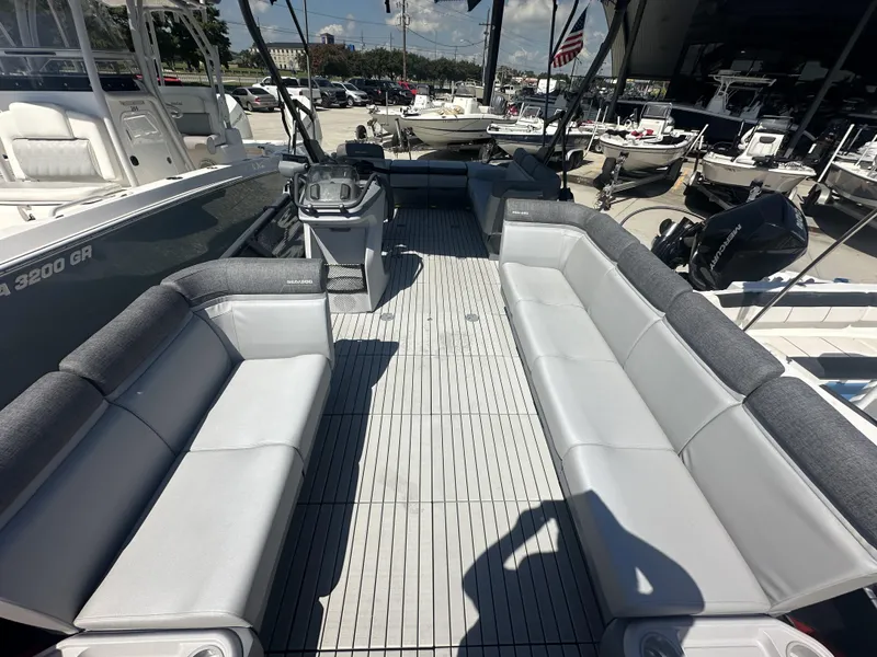 Slide: The Image of 2023 Sea-Doo Switch Cruise 21' - 230HP pontoon boat interior with spacious seating. - 16
