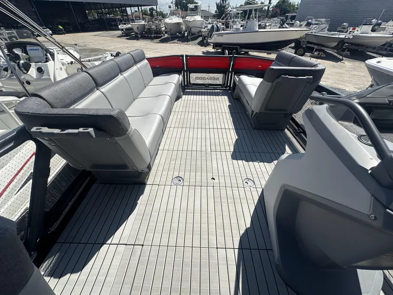 Slide: The Image of 2023 Sea-Doo Switch Cruise 21' 230HP pontoon boat interior with spacious seating. - 9