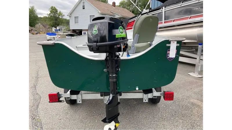 Slide: The Image of 2023 Duranautic DNB14RDS boat with outboard motor on trailer. - 3