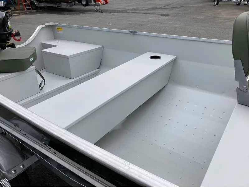 Slide: The Image of 2023 Duranautic DNB14RDS aluminum boat interior with seating and storage compartments. - 8