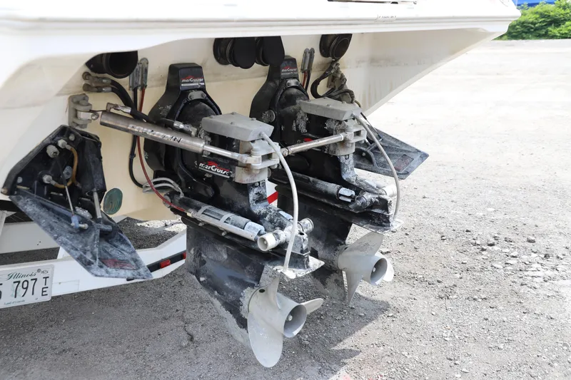 Slide: The Image of 1999 Fountain 42 Staggered boat engines and propellers on display. - 22