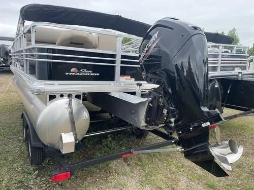 Slide: The Image of 2023 Sun Tracker SportFish 20 DLX pontoon boat with Mercury outboard motor. - 4