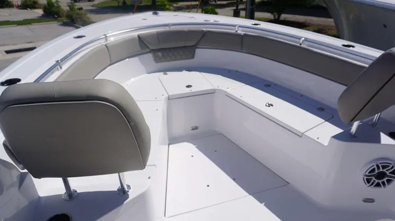 Slide: The Image of 2025 Sportsman 261 Heritage boat interior with cushioned seating and storage compartments. - 3