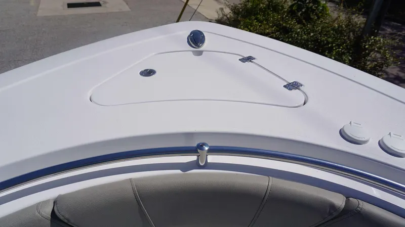 Slide: The Image of Bow area of 2025 Sportsman 261 Heritage boat with storage hatch and seating. - 4