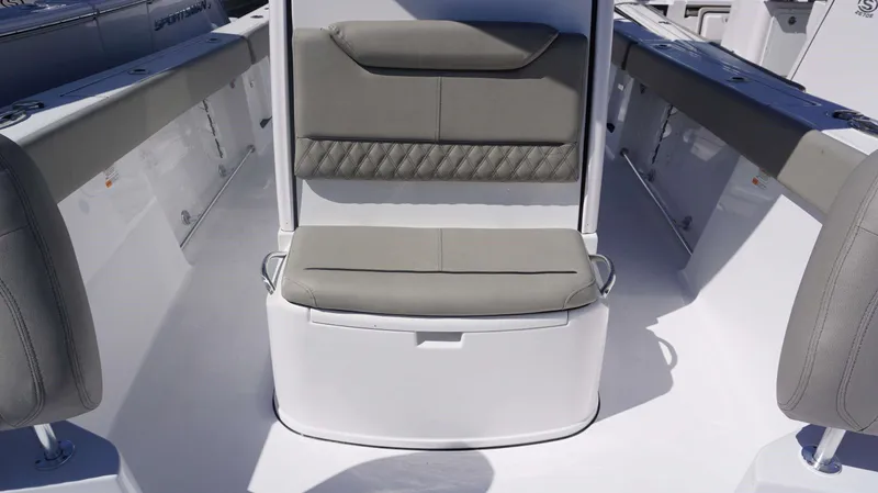 Slide: The Image of 2025 Sportsman 261 Heritage boat interior with cushioned seating and sleek design. - 6