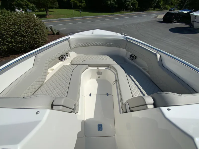 Slide: The Image of 2025 Pursuit DC 306 Dual Console boat with spacious bow seating area. - 28