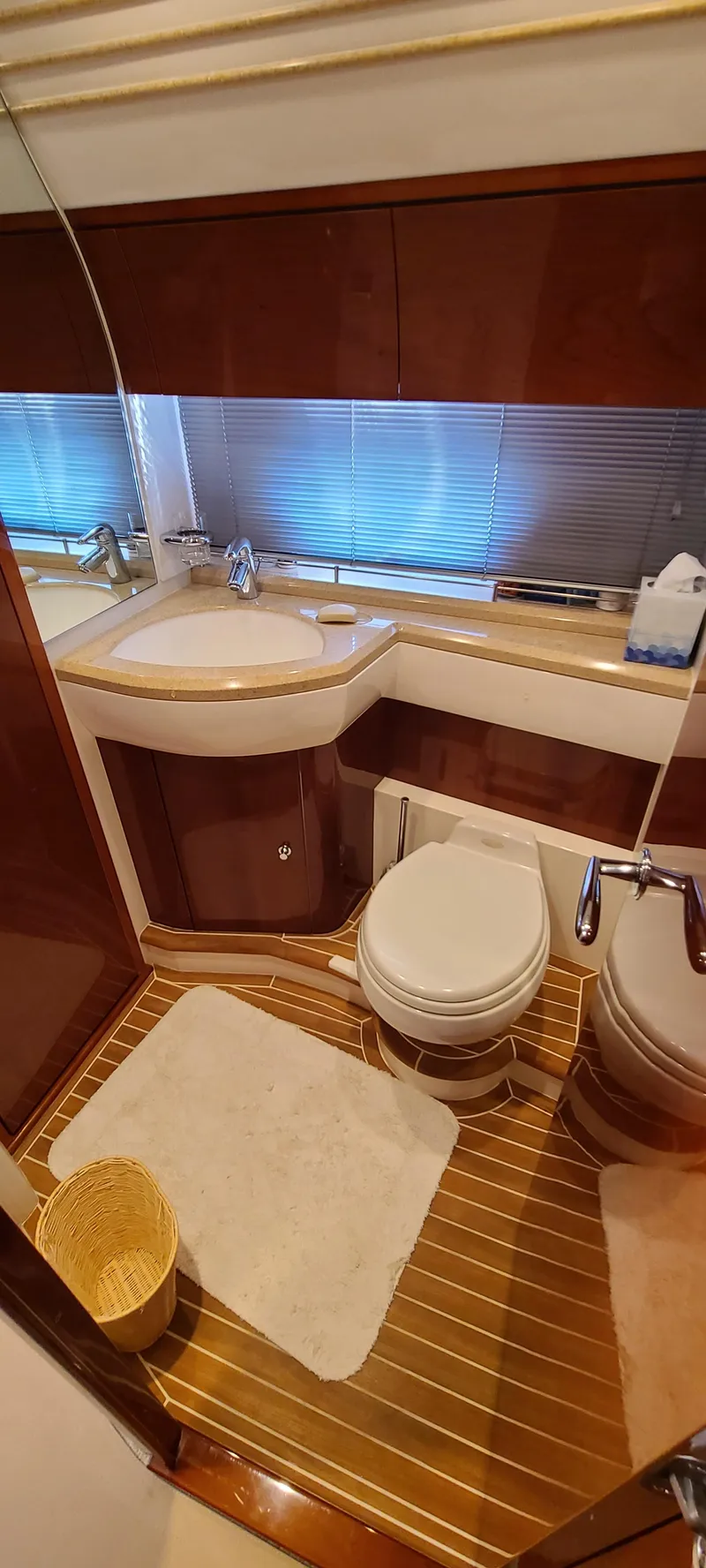 Slide: The Image of Luxurious bathroom on a 2006 Viking Sport Cruisers 61 Flybridge yacht. - 22