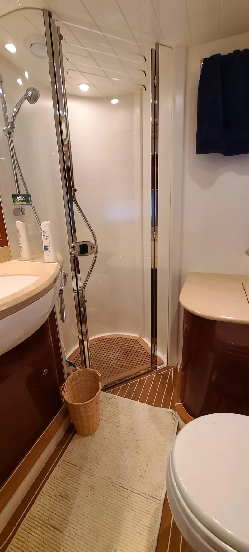 Slide: The Image of Bathroom of 2006 Viking Sport Cruisers 61 Flybridge with shower, sink, and toilet. - 25