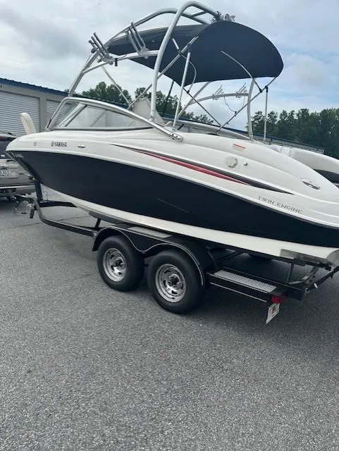 Slide: The Image of 2007 Yamaha Boats AR 210 on trailer in parking lot. - 2