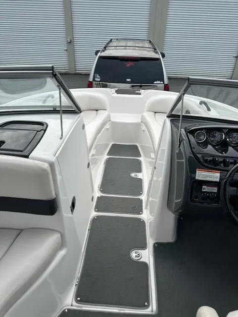 Slide: The Image of 2007 Yamaha Boats AR 210 interior view with seating and dashboard. - 5