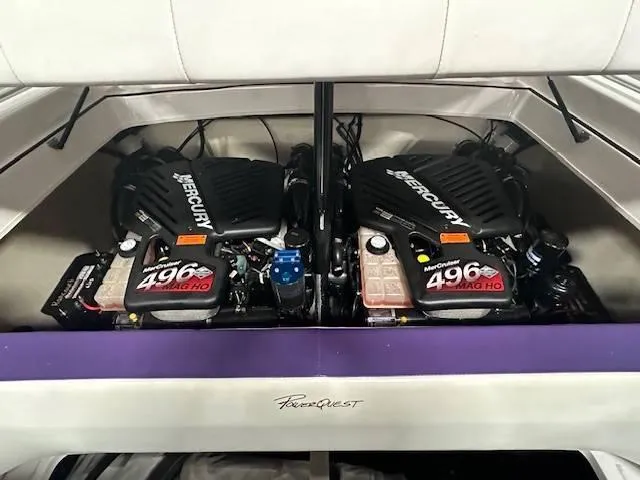 Slide: The Image of Twin Mercury 496 MAG HO engines in a 2004 Powerquest 340 Vyper boat. - 13