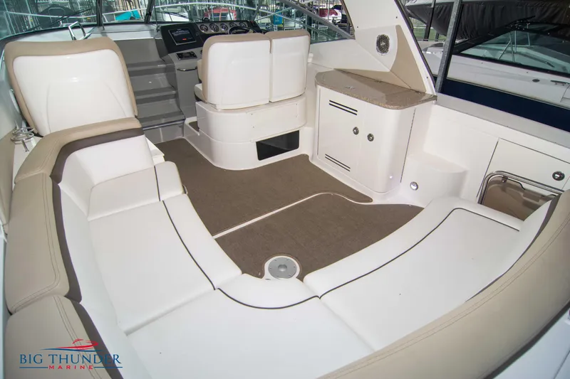 Slide: The Image of Luxurious interior of 2016 Sea Ray 370 Sundancer yacht with plush seating. - 14
