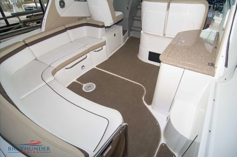 Slide: The Image of Interior of 2016 Sea Ray 370 Sundancer boat with spacious seating and modern design. - 15