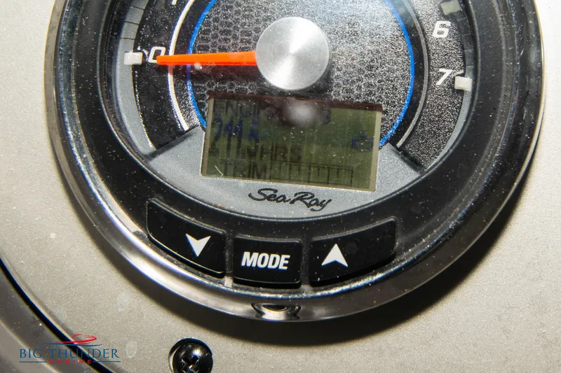 Slide: The Image of Close-up of 2016 Sea Ray 370 Sundancer dashboard gauge with digital display. - 24
