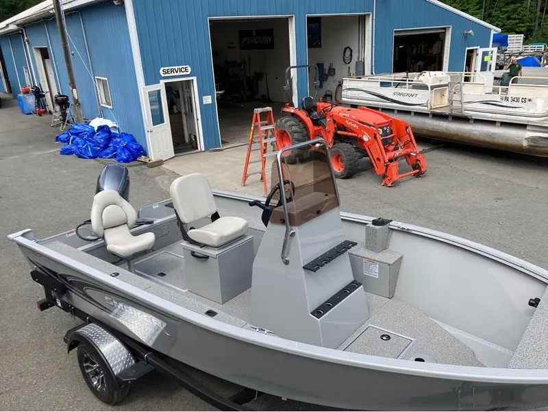 Slide: The Image of 2024 Smoker Craft 160 Freedom CC boat at a service center. - 3