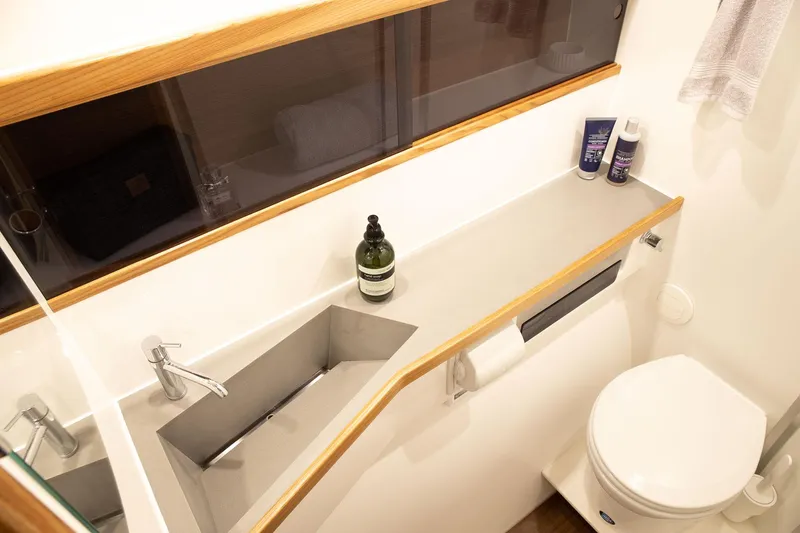 Slide: The Image of Modern bathroom in 2026 Dragonfly 40 yacht with sleek sink and toilet. - 13