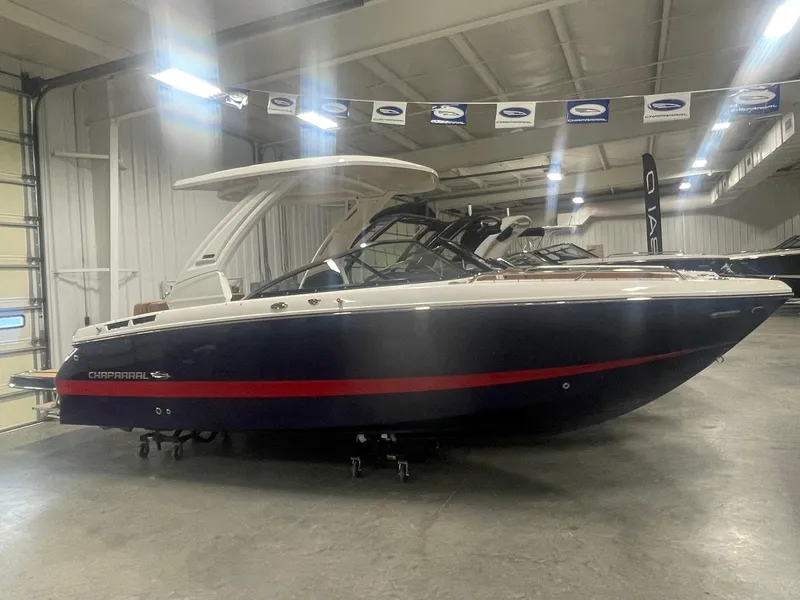 The Image of 2025 Chaparral 267 SSX boat in showroom, side view. - 0
