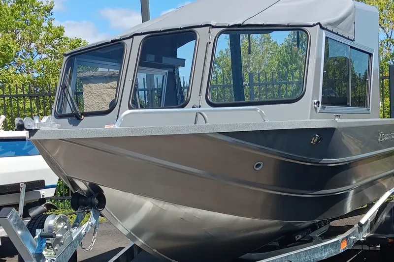 The Image of 2025 Spartan 200 Astoria boat on a trailer, front view. - 0