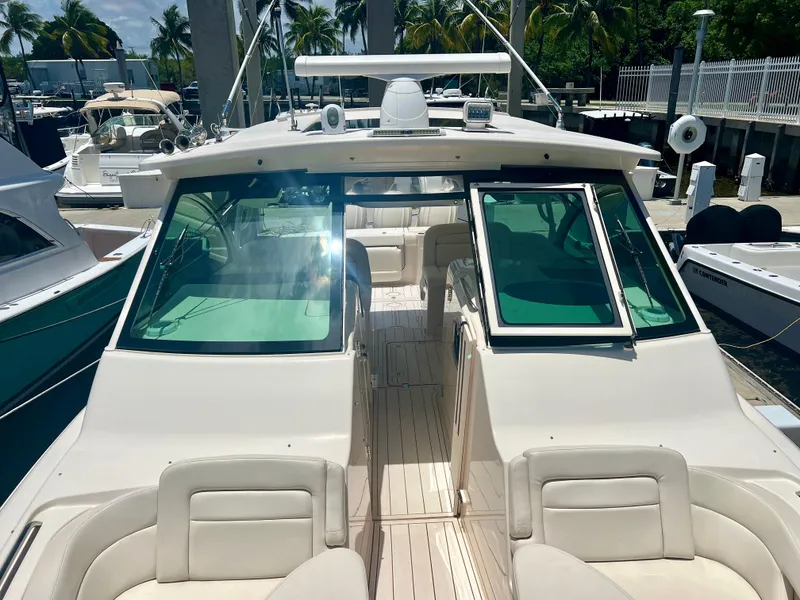Slide: The Image of 2021 Grady-White Freedom 375 boat docked at a marina. - 17