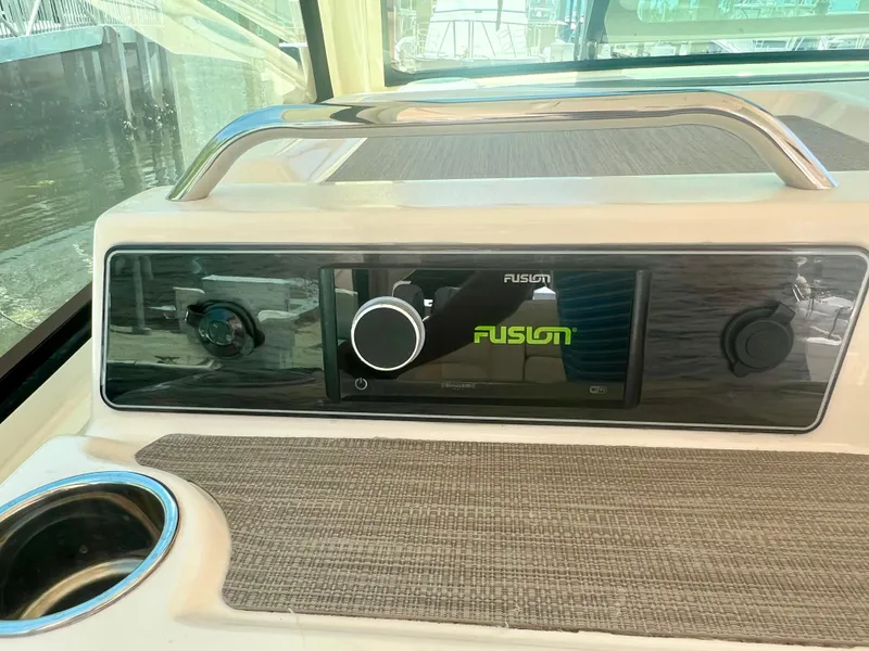 Slide: The Image of Grady-White Freedom 375 2021 boat dashboard with Fusion stereo system. - 21