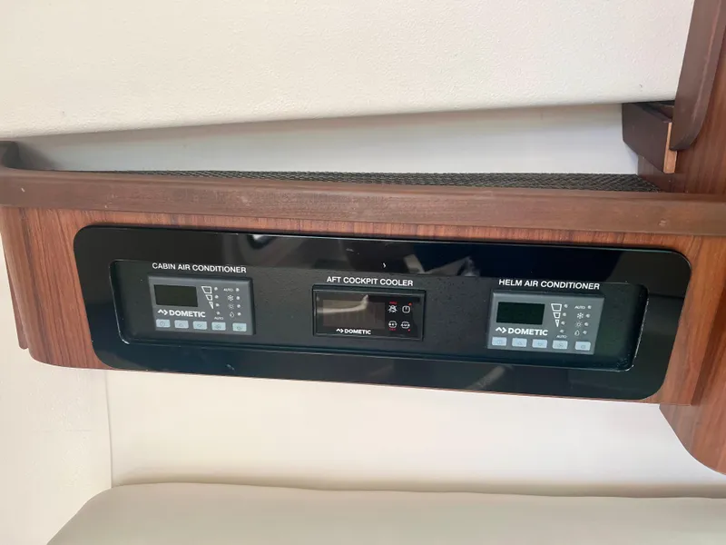 Slide: The Image of Control panel of air conditioning units in 2021 Grady-White Freedom 375 boat. - 25