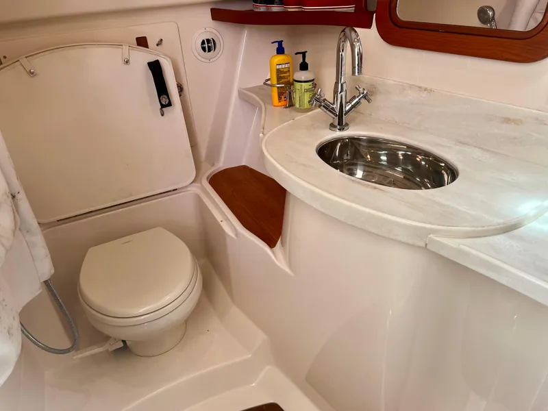 Slide: The Image of 2021 Grady-White Freedom 375 boat bathroom with sink and toilet. - 28
