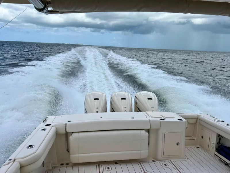 Slide: The Image of Grady-White Freedom 375 boat cruising on open water, 2021 model. - 39