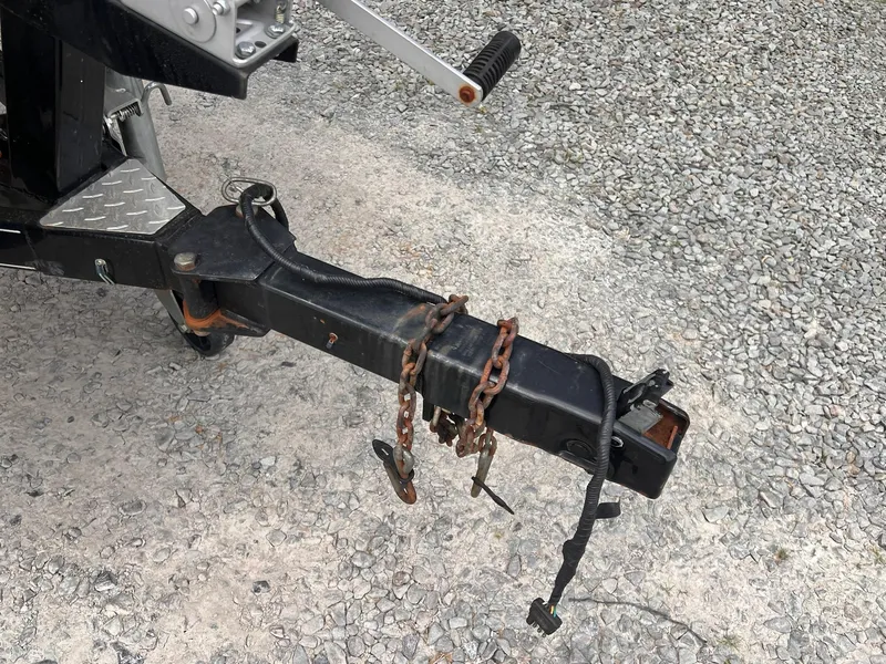 Slide: The Image of Trailer hitch of a 2007 Stratos 176XT on gravel surface. - 23