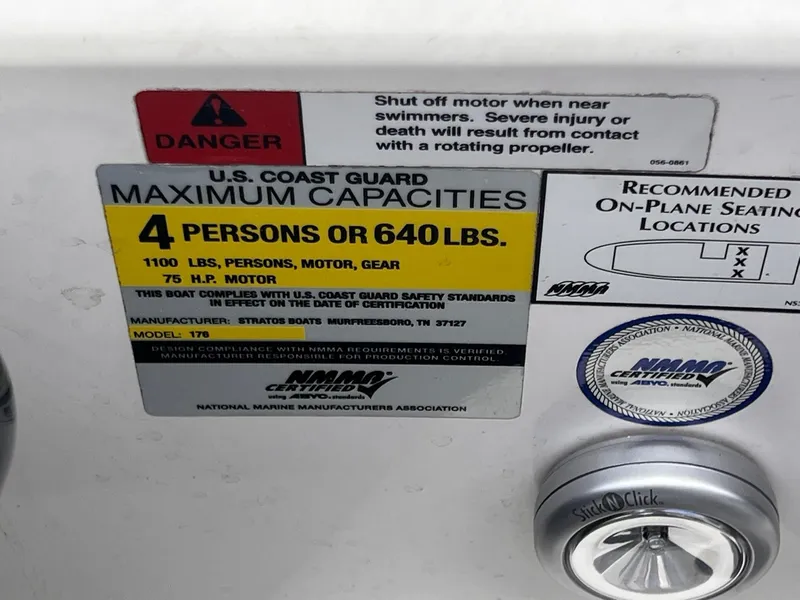 Slide: The Image of 2007 Stratos 176XT capacity label, 4 persons or 640 lbs, safety warnings included. - 31
