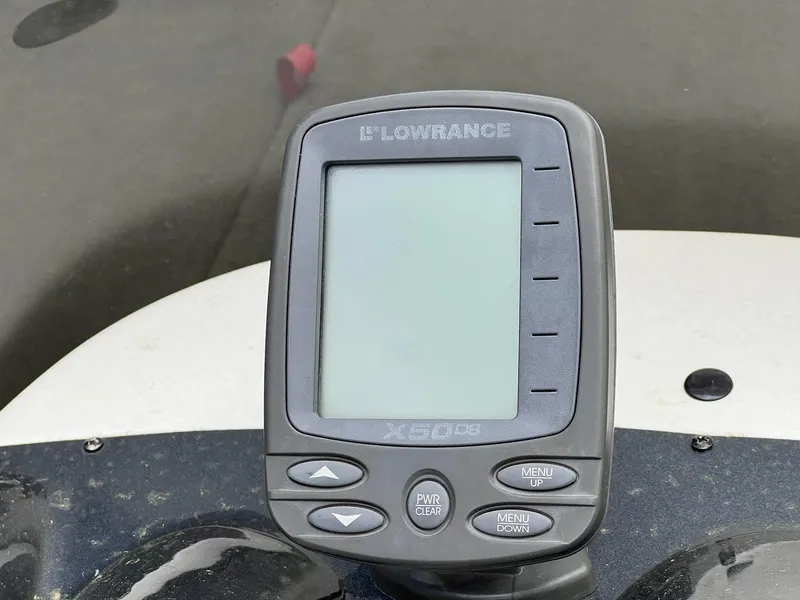 Slide: The Image of Lowrance X50 DS fishfinder on 2007 Stratos 176XT boat dashboard. - 5
