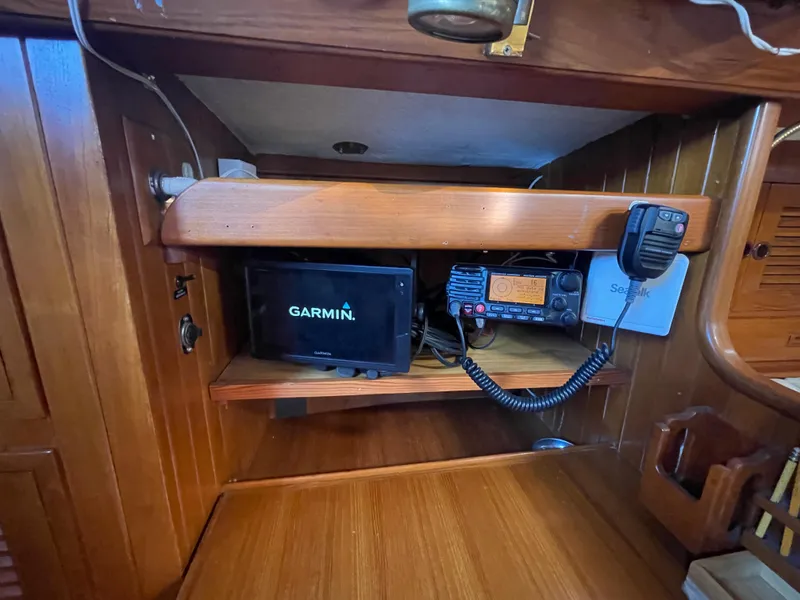 Slide: The Image of 1984 Tayana Sloop Rigged Cutter navigation equipment with Garmin and radio system. - 25