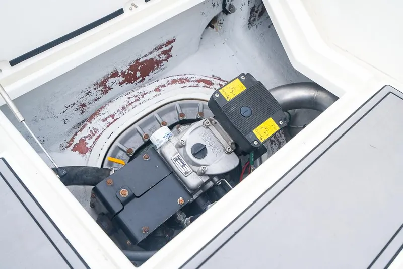 Slide: The Image of Engine compartment of a 2009 SeaVee 390I boat showing mechanical components. - 11