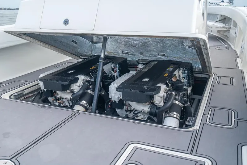 Slide: The Image of 2009 SeaVee 390I boat engine compartment with twin engines. - 15