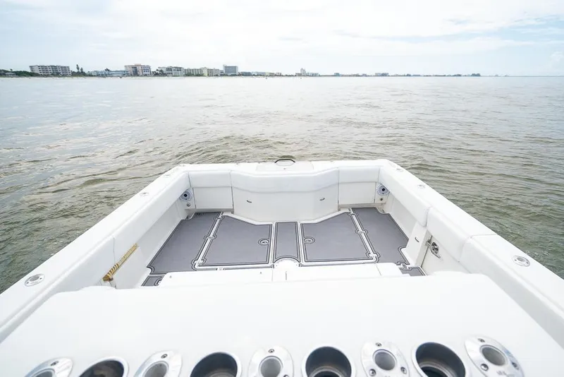 Slide: The Image of 2009 SeaVee 390I boat deck with ocean view and distant shoreline. - 24