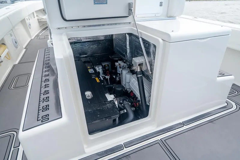 Slide: The Image of Engine compartment of a 2009 SeaVee 390I boat with open hatch. - 29