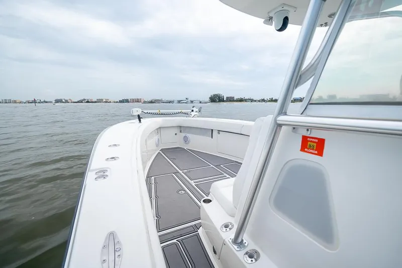 Slide: The Image of 2009 SeaVee 390I boat deck on calm waters. - 30