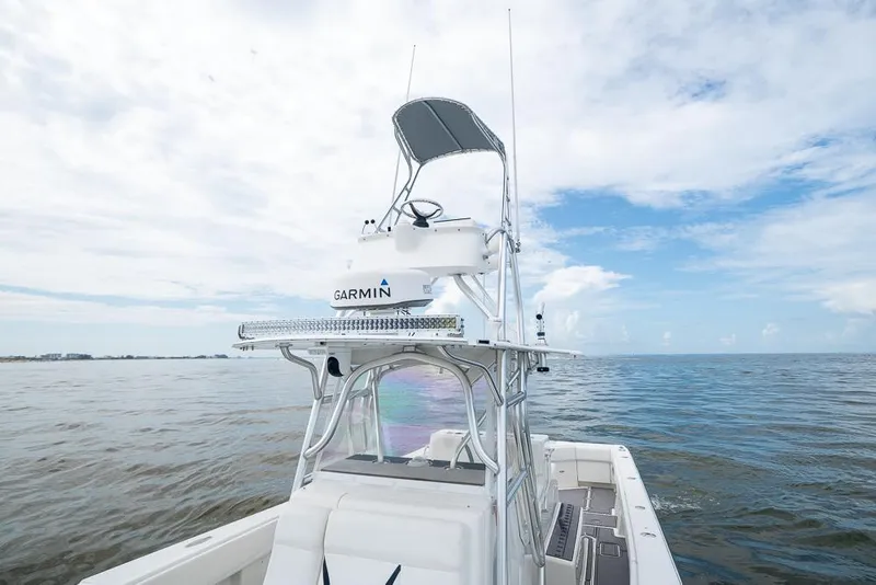 Slide: The Image of 2009 SeaVee 390I boat with Garmin equipment on open water. - 38