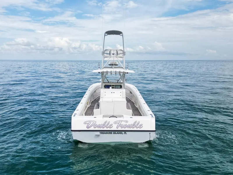 Slide: The Image of 2009 SeaVee 390I boat named Double Trouble on open water. - 4