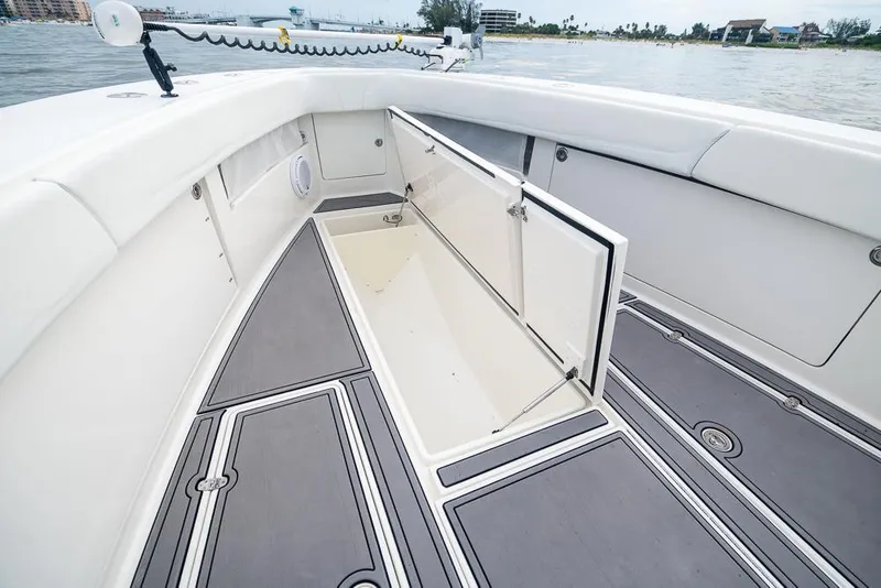 Slide: The Image of 2009 SeaVee 390I boat with open storage compartment on deck. - 41
